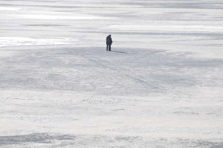 Couple hugging on frozen lake