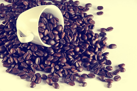Coffee cup with coffee beans