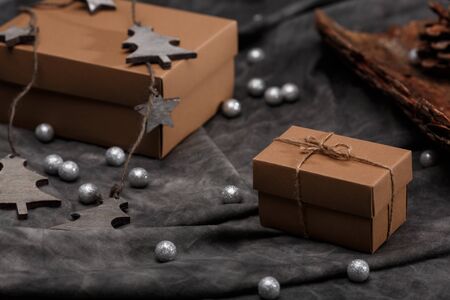 Christmas decoration and gift boxes over grey background. Copy space.の写真素材