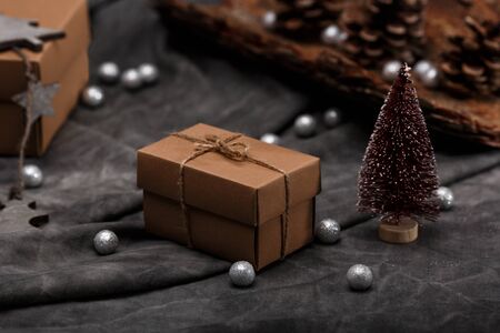 Christmas decoration and gift boxes over grey background. Copy space.の写真素材