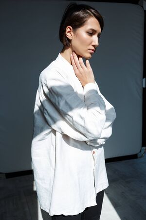 Portrait of young beautiful brunette girl.の写真素材