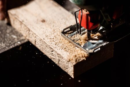 Close up photo of cutting wood with fretsaw.の写真素材