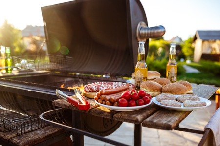Barbecue grill party. Tasty food on wooden desk.の写真素材