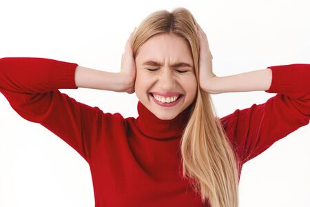 Beauty, women and fashion concept. Close-up portrait of annoyed and distressed young blond woman...