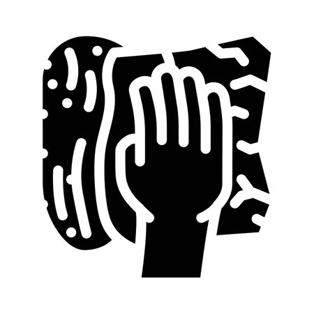 soaking spills with paper towel glyph icon vector illustrationのイラスト素材