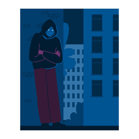 Hooded criminal hiding in a dark alley at night, urban crime conceptのイラスト素材
