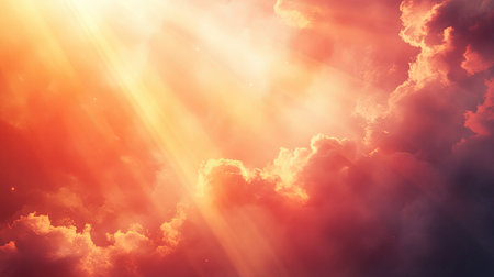 Sun rays breaking through dramatic glowing clouds