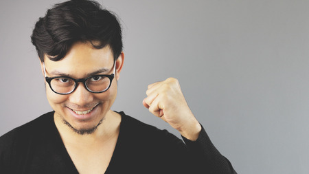 A man ready to fight his problem.の写真素材