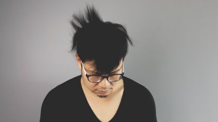 Shaking head up and down.の写真素材