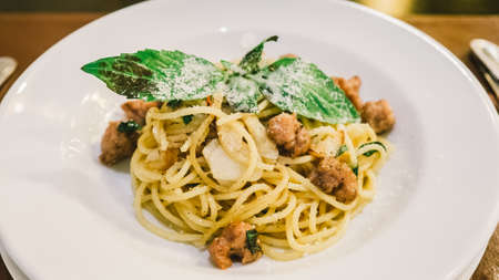 Simple spaghetti on white dish.の写真素材