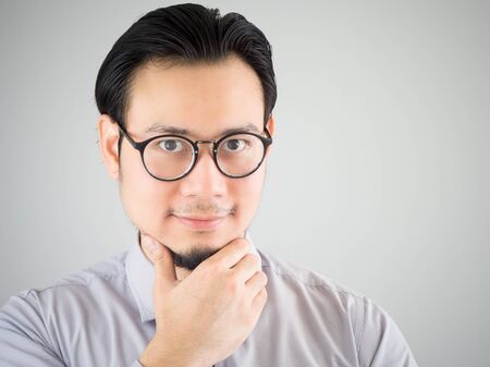 Confidense and happy Asian business man.の写真素材