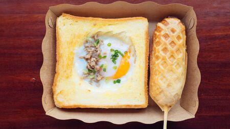 Breakfast set of toast and egg.