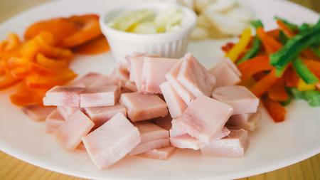 Close up of homemade pizza ingredients. Focus on ham.の写真素材