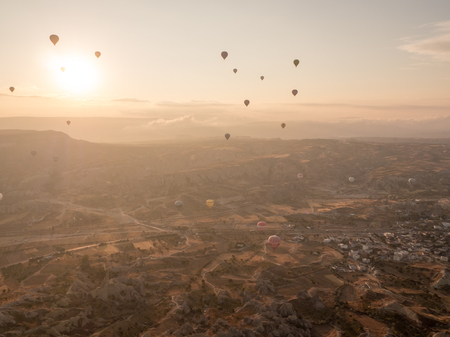 GOREME, TURKEYâ SEPTEMBER 16 2016: Balloon tour in morning sunrise.のeditorial素材