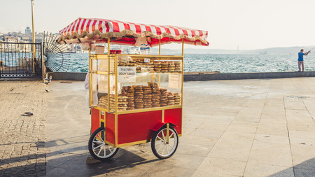 ISTANBUL, TURKEY - SEPTEMBER 10-13 2016: Street cart vending selling breads.のeditorial素材