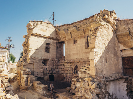 Ortahisar, Nevsehir, Turkey - September 16, 2016: Old damaged stone town of Ortahisar.のeditorial素材