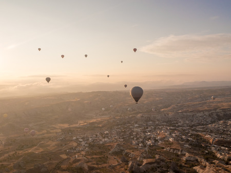 Goreme, Turkey - September 16, 2016: Balloon trip in Cappadocia region with unique landscape and sunrise.のeditorial素材