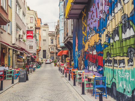 Balat, Istanbul, Turkey - September 12, 2016: Colorful street with tea cafe in Balat.のeditorial素材