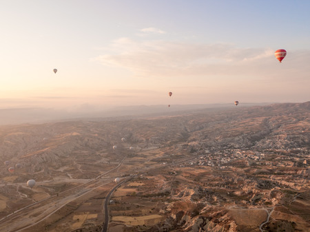 Goreme, Turkey - September 16, 2016: Many hot air balloons over the sky of Cappadocia region.のeditorial素材