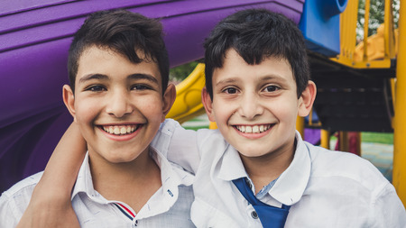 Istanbul, Turkey - September 12, 2016: Headshot portrait of Turkish boys on playground.のeditorial素材
