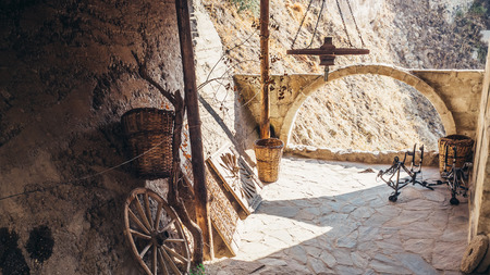 Ortahisar, Nevsehir, Turkey - September 16, 2016: Local garage in a stone house.のeditorial素材