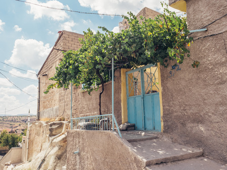 Ortahisar, Nevsehir, Turkey - September 16, 2016: Famouse stone house unique traditional architecture in Cappadocia.のeditorial素材