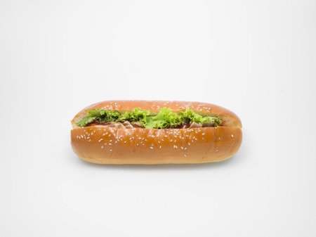 Sausage burger with bacon on white background.の写真素材