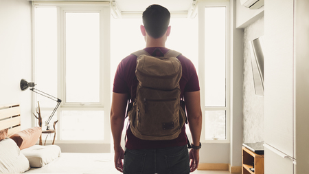 Asian man with backpack ready to travel and go adventure.のeditorial素材