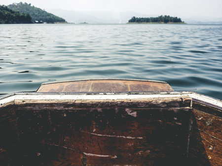 Lake travel adventure on boat in Asia.の写真素材