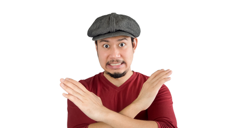 Asian man is saying no. Isolated in white background.の写真素材