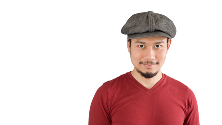 Asian man is feeling confident. Isolated in white background.の写真素材