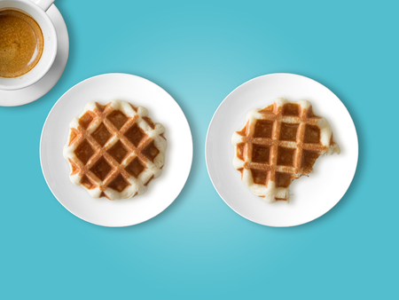 Breakfast and break time set of two waffles and one cup of coffee.の写真素材