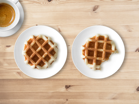 Breakfast and break time set of two waffles and one cup of coffee.の写真素材