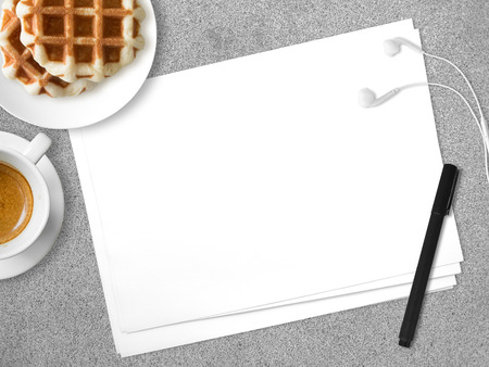 Concept of thinking for idea. Empty white paper with black pen waffles and coffee.の写真素材