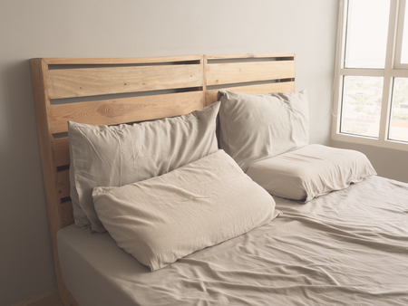Cozy simple loft bed made of old pine wood.の写真素材