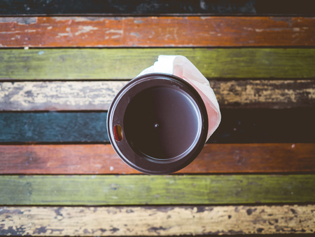 Hot instant coffee cup on vintage wooden table.の写真素材
