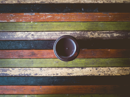 Hot instant coffee cup on vintage wooden table.の写真素材