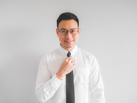 Happy Asian employee businessman in offiice uniform.の写真素材