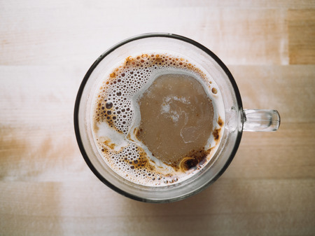 Close up top view of hot cup of coffee.