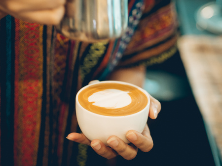 Process of making Latte coffee in the coffee workshop.の写真素材