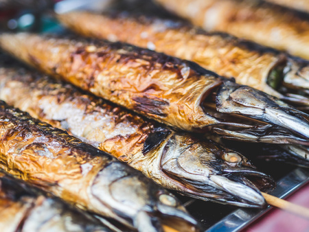 Thai style Grilled Saba fish skewed in stick. Thailand streetfood.の写真素材