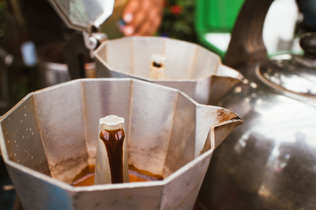 Close up of Moka pot with some of bolied coffee inside.の写真素材