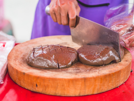 Curdled blood of duck selling as food in Thailand local market.