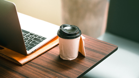 Hot cup of coffee in comfortable cafe in the morning.の写真素材