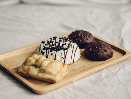 Set of chocolate doughnuts and pie.の写真素材
