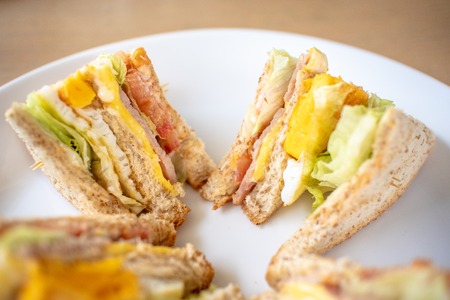Closeup of breakfast set of club sandwiches.の写真素材