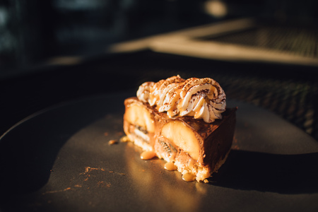 Close up of caramel cake with warm sunlight atmosphere.の写真素材