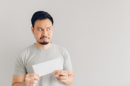 Asian man is hate and sad the white mail message or the bill.の写真素材