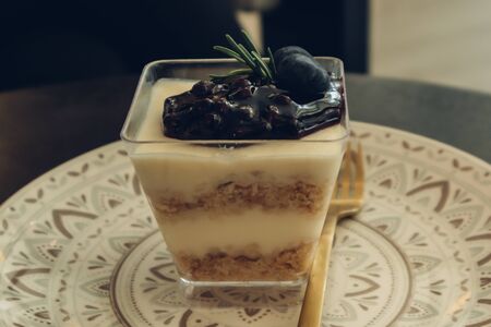 Close up of Blueberry cheesecake in a transparent cup.の写真素材