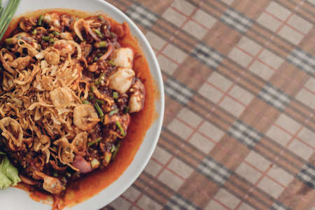 Fresh Oysters salad with garlics served on the table in Thailand local restaurant.の写真素材